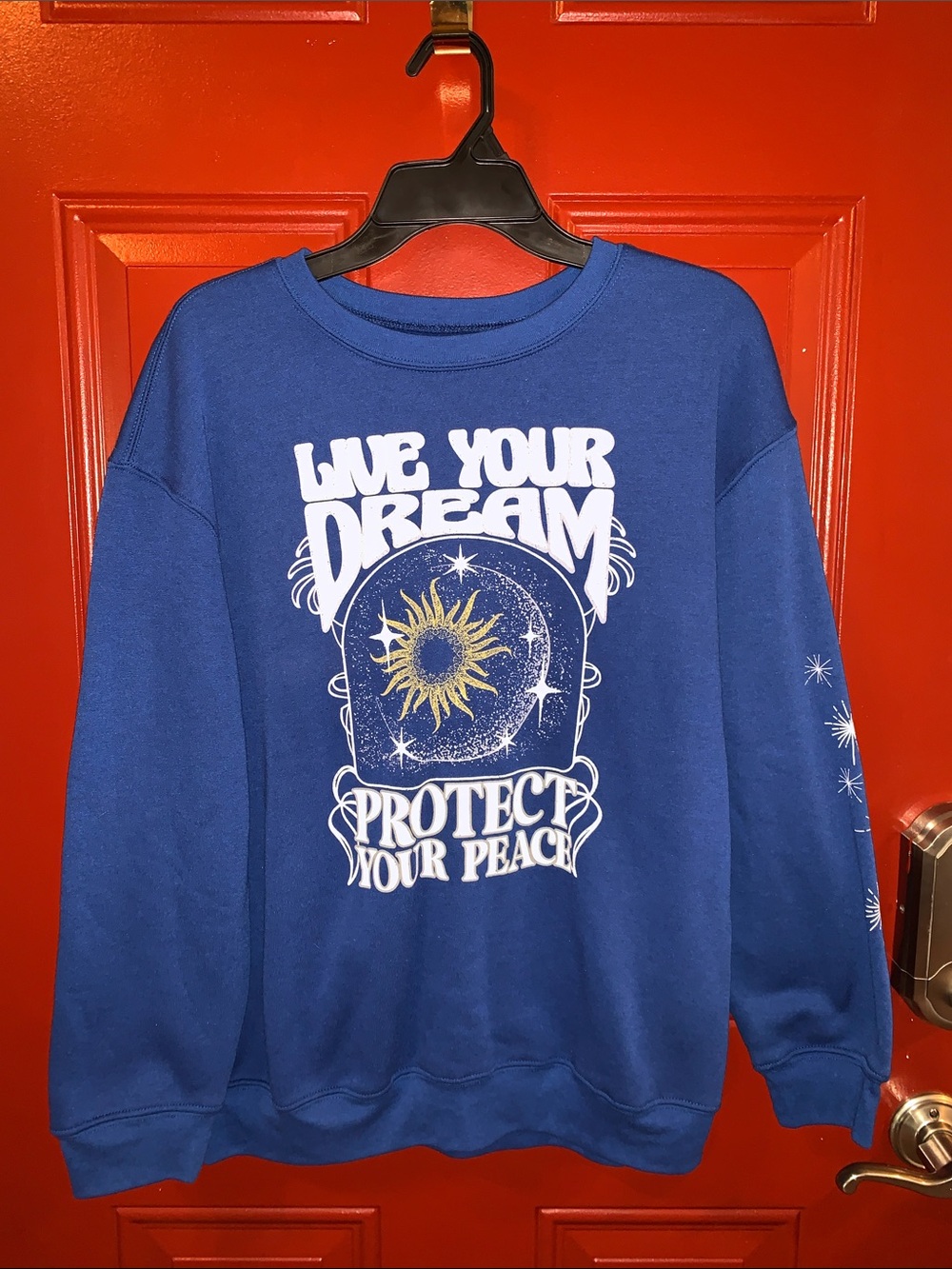 Awake Blue Crewneck Sweatshirt with White and Gold Celestial Graphic